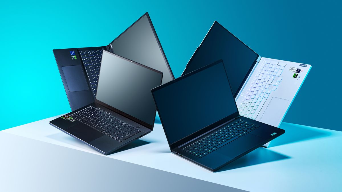 Four gaming laptops on a white plinth with a blue background.