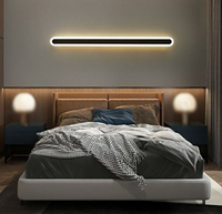 Wall mounted linear wall light
Create the same effect with a wall mounted lighting strip that you can fit snugly above your bed, giving a cozy glow to your bedroom.