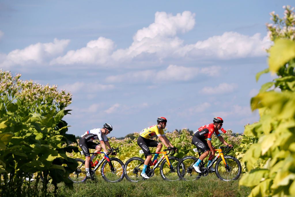 PRZEMYSL POLAND AUGUST 10 LR Matej Mohoric of Slovenia Phil Bauhaus of Germany Yellow Leader Jersey Heinrich Haussler of Australia and Team Bahrain Victorious during the 78th Tour de Pologne 2021 Stage 2 a 201km stage from Zamo to Przemyl 341m TourdePologne TDP2021 UCIWT on August 10 2021 in Przemysl Poland Photo by Bas CzerwinskiGetty Images