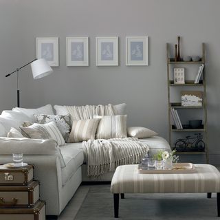living room with grey walls and sofa