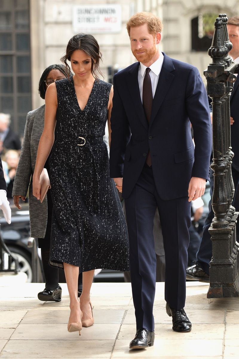 Clothing, Footwear, Leg, Coat, Trousers, Collar, Shirt, Outerwear, Standing, Formal wear,