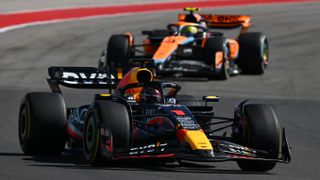 Max Verstappen of the Netherlands driving the (1) Oracle Red Bull Racing RB19 leads Lando Norris of Great Britain driving the (4) McLaren MCL60 Mercedes on track