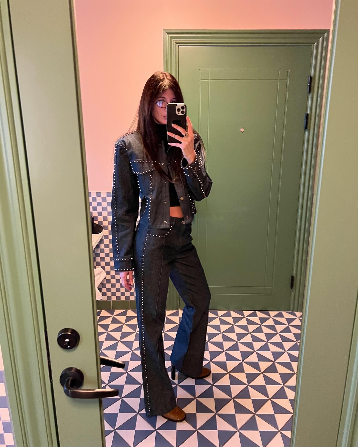 Woman in flared leg jeans.