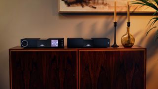 Naim NSC222 and NAP 250 separates in a lounge on a wooden table