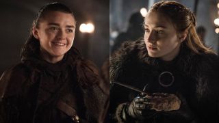From left to right: Maisie Williams as Arya Stark smiling and Sophie Turner as Sansa Stark in Game of Thrones
