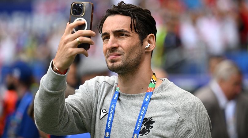 Giorgi Gvelesiani on his phone ahead of Georgia&#039;s game against Czechia at Euro 2024.