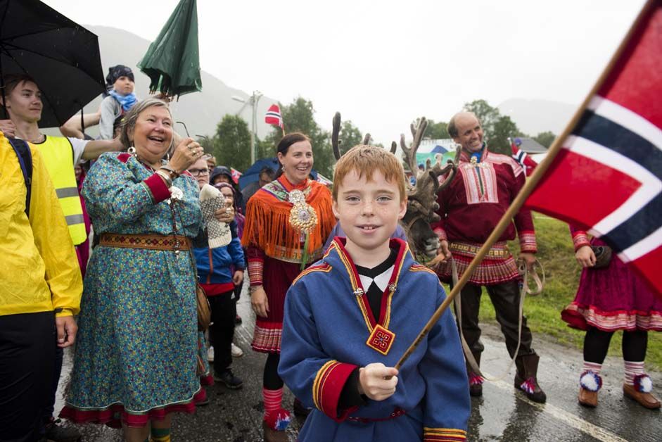There young boy waves the Norwegian flag