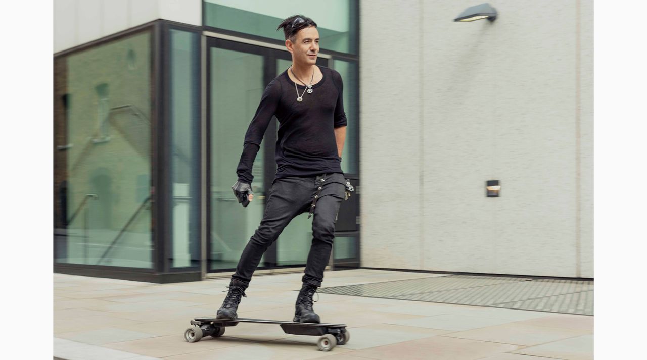 Portrait of Tameem Antoniades skateboarding in the street, by David Vintiner 