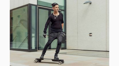Portrait of Tameem Antoniades skateboarding in the street, by David Vintiner 