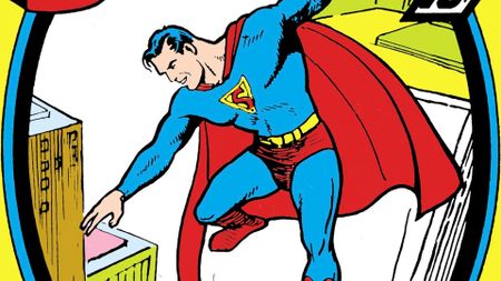 Superman soaring over Metropolis on the cover of 1939's Superman #1