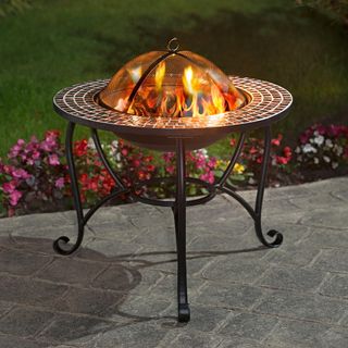 mosaic top fire pit table and garden area