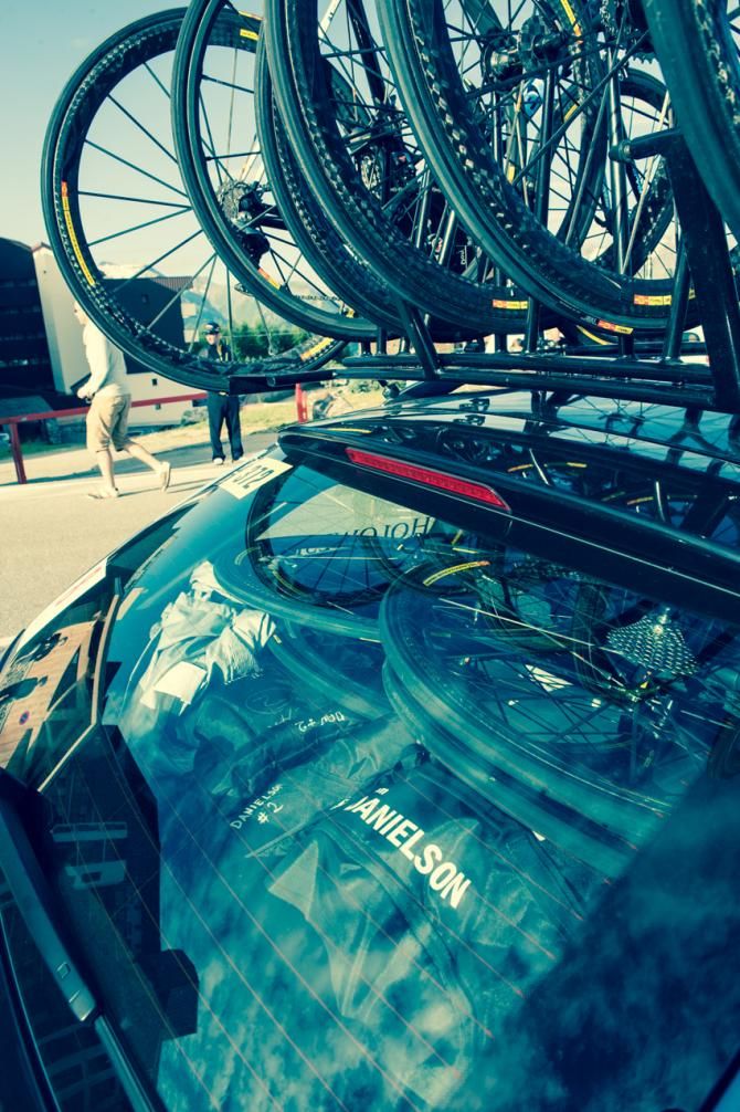 On top of L&rsquo;Alpe d&rsquo;Huez, Tom Danielson&rsquo;s bags peak out from under the spare Mavic wheels