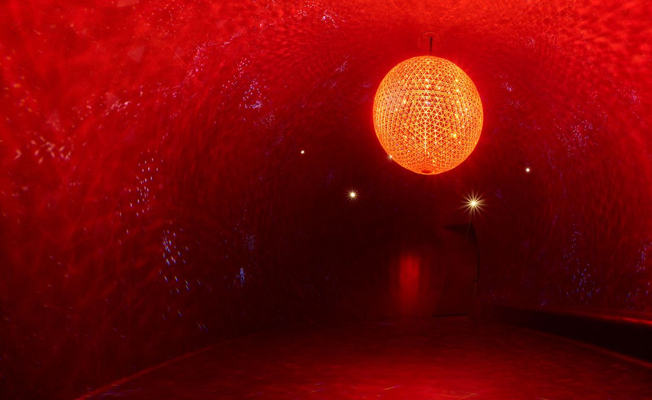 Red room with a Swarovski crystal ball