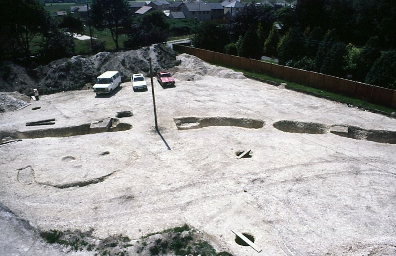 a bird's eye view of the excavation of a stone structure