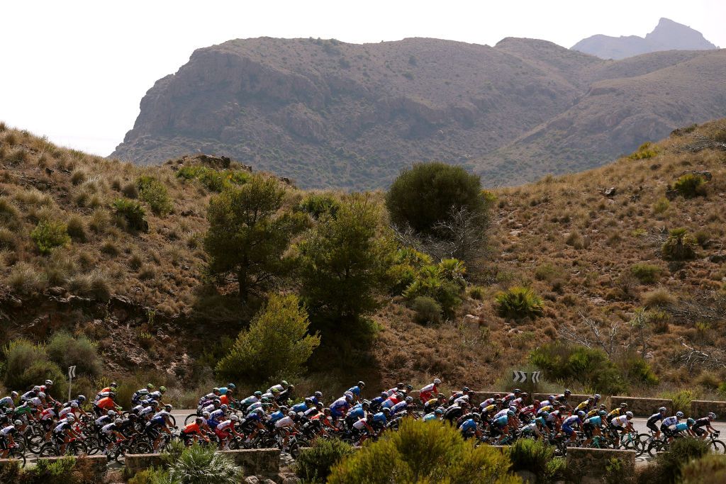 LA MANGA SPAIN AUGUST 21 A general view of the peloton compete during the 76th Tour of Spain 2021 Stage 8 a 1737 km stage from Santa Pola to La Manga del Mar Menor lavuelta LaVuelta21 on August 21 2021 in La Manga Spain Photo by Gonzalo Arroyo MorenoGetty Images
