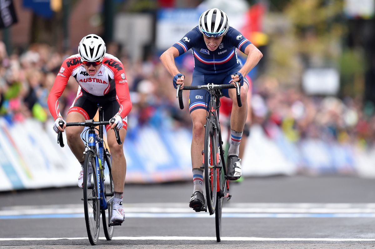 Clement Betouigt-Suire (France) throws his bike on the line but its Felix Gall (Austria) taking home gold