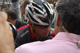 A dejected Lance Armstrong (RadioShack) explains his defeat at the stage finish at Avoriaz