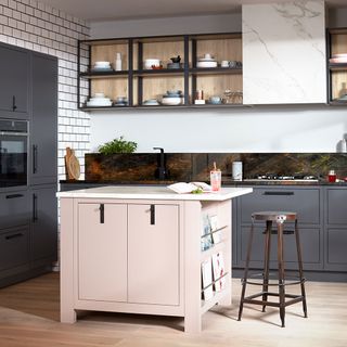 kitchen with white wall wooden floor and grey cabinetes