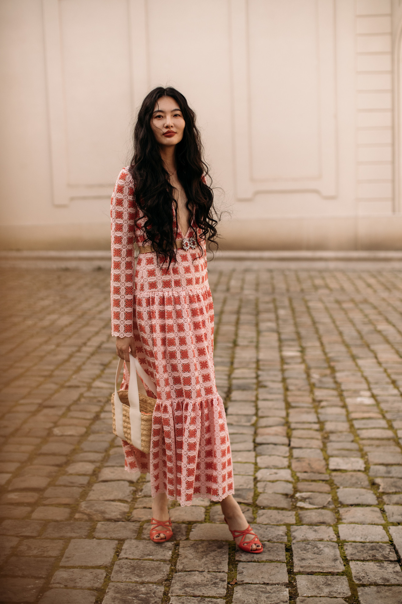 woman wearing a checkered red and white maxi dress