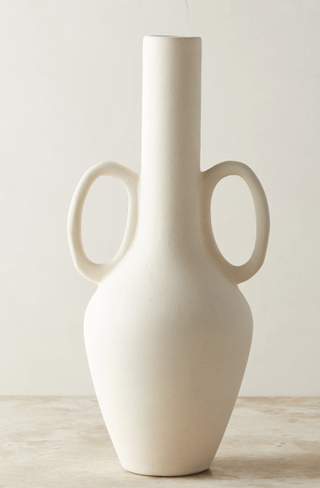 slim white vase with two round handles