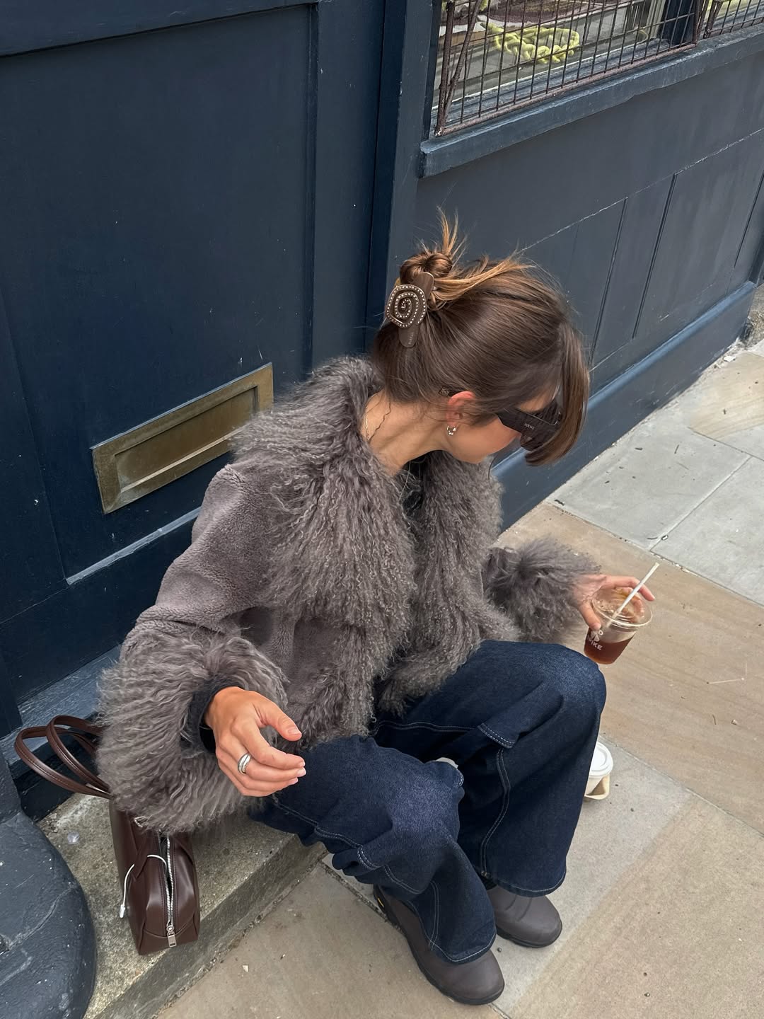 Poppy Almond wearing a Charlotte Simone coat.