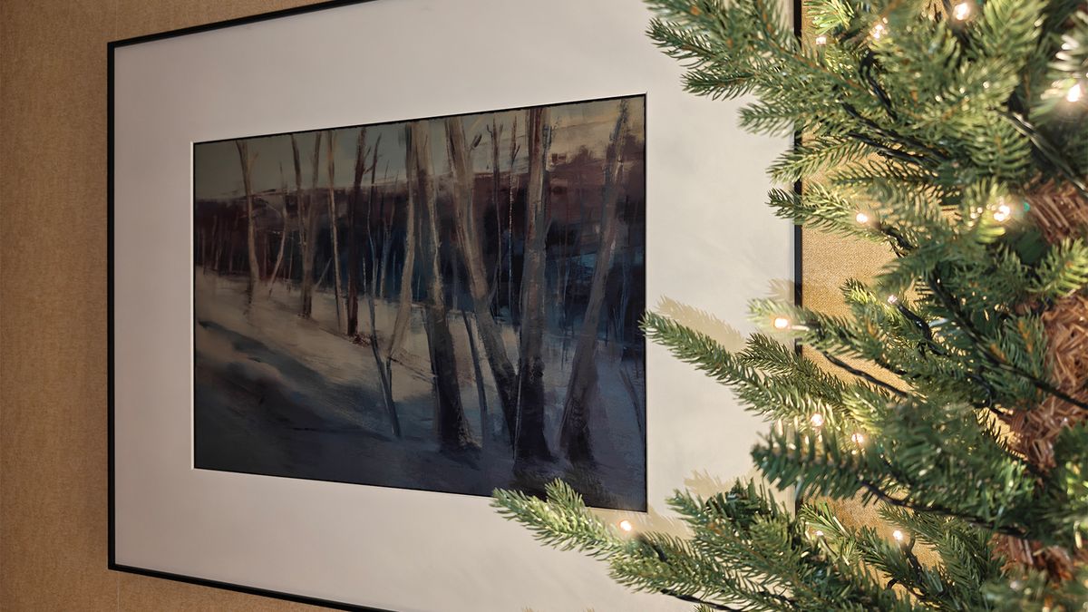 InkPoster review; a black art frame on a wall