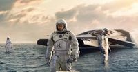 Three astronauts and their spaceship on a water-covered planet