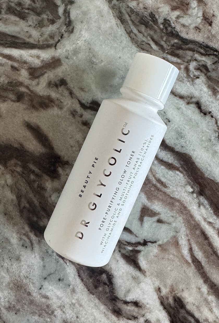 A photo of Beauty Pie Dr Glycolic exfoliator on a marble table