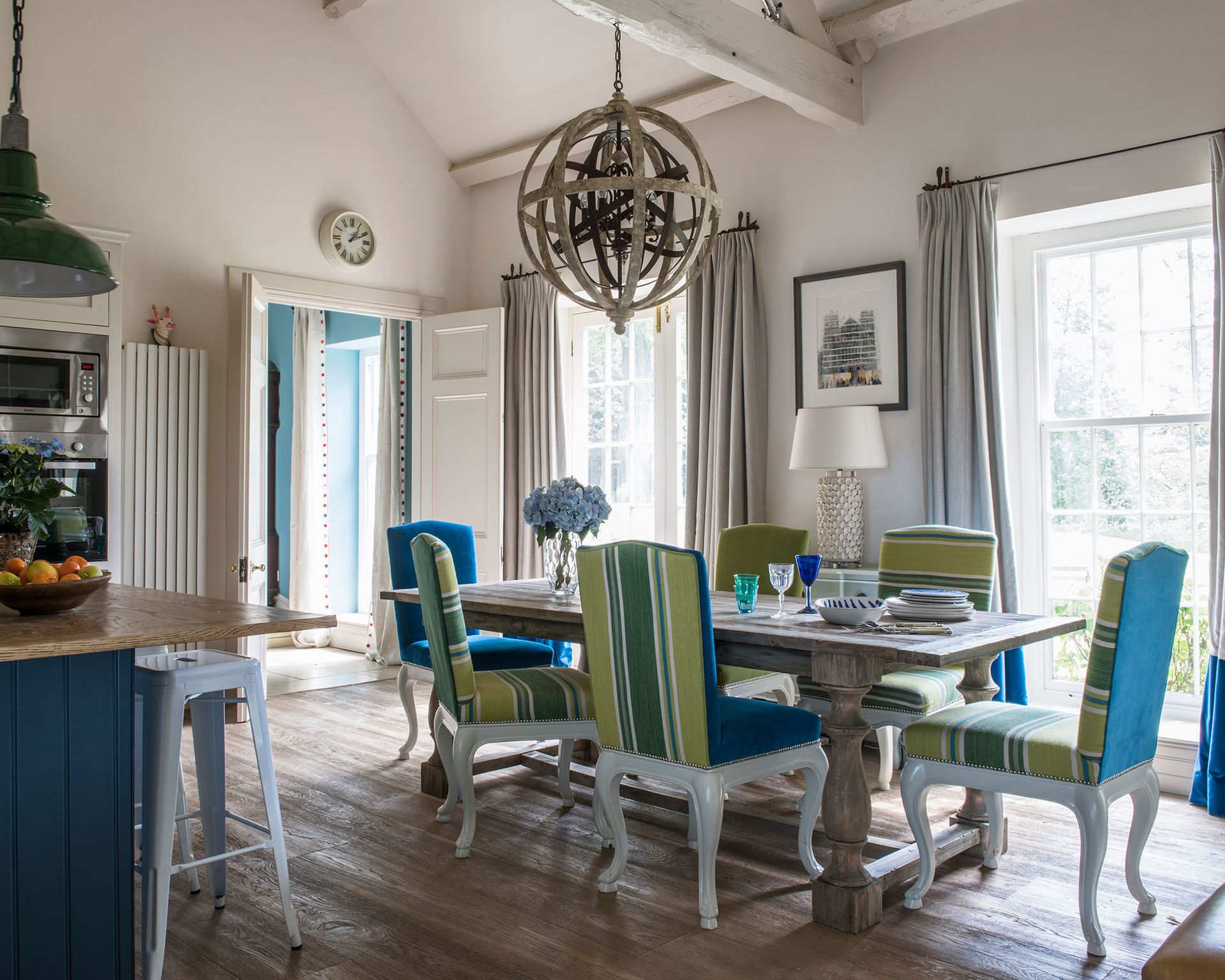 Dining room ideas with wooden table and patterned chairs