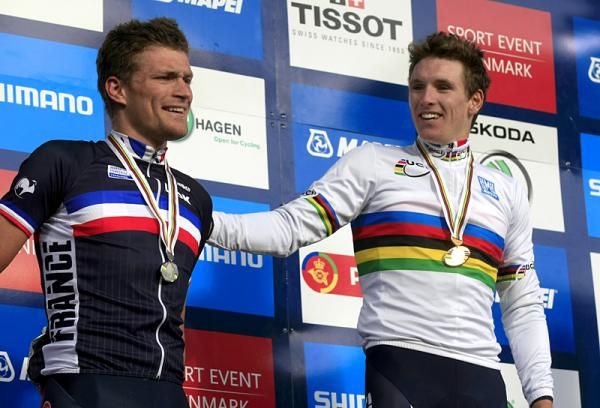 Adrien Petit and world champion Arnaud D&eacute;mare on the podium