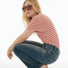 Dakota Fanning wearing Madewell striped tee and jeans