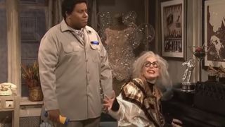 Kenan Thompson as a superintendent and Lady Gaga as her future self at a piano on SNL