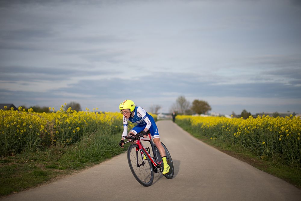 Flavia Oliveira (BRA) of Lensworld Zannata Cycling Team rides in the late-afternoon sunset during the 2.8km time trial prologue of Elsy Jacobs