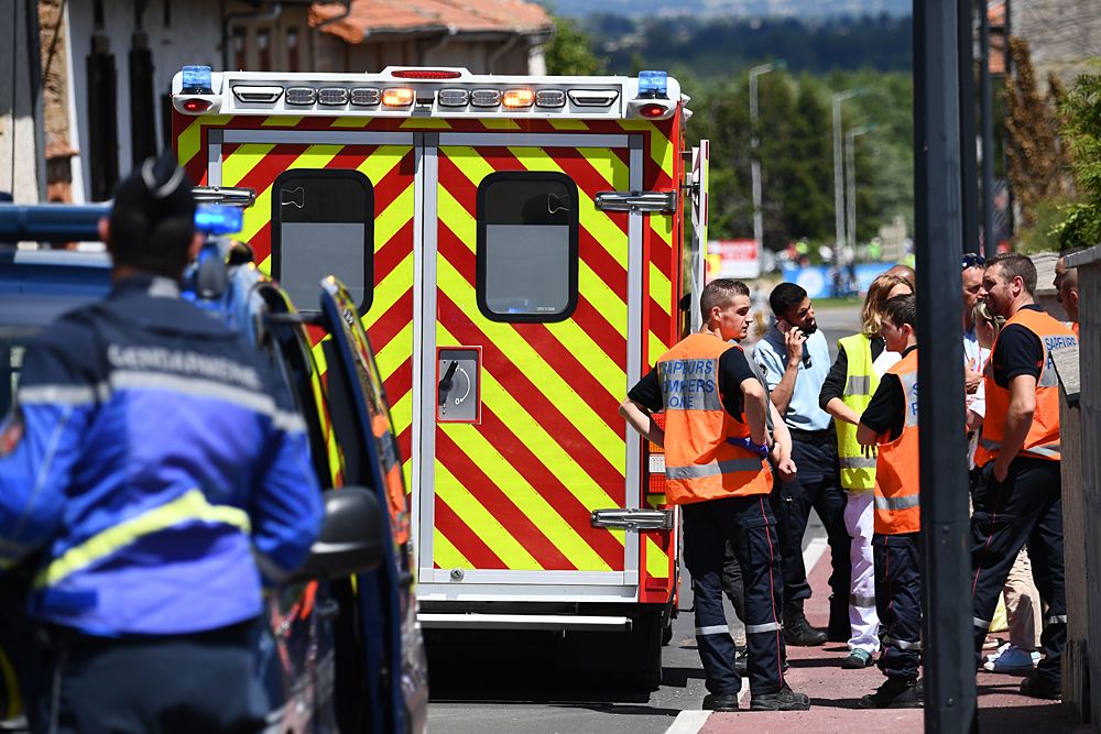 An ambulance car transporting Team Ineos rider Great Britain's Christopher Froome, after he fell on a training run ahead of the fourth stage of the 71st edition of the Criterium du Dauphine cycling race, arrives at the Centre Hospitalier in Roanne on June 12, 2019