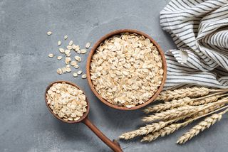 a bowl and spoon full of oats