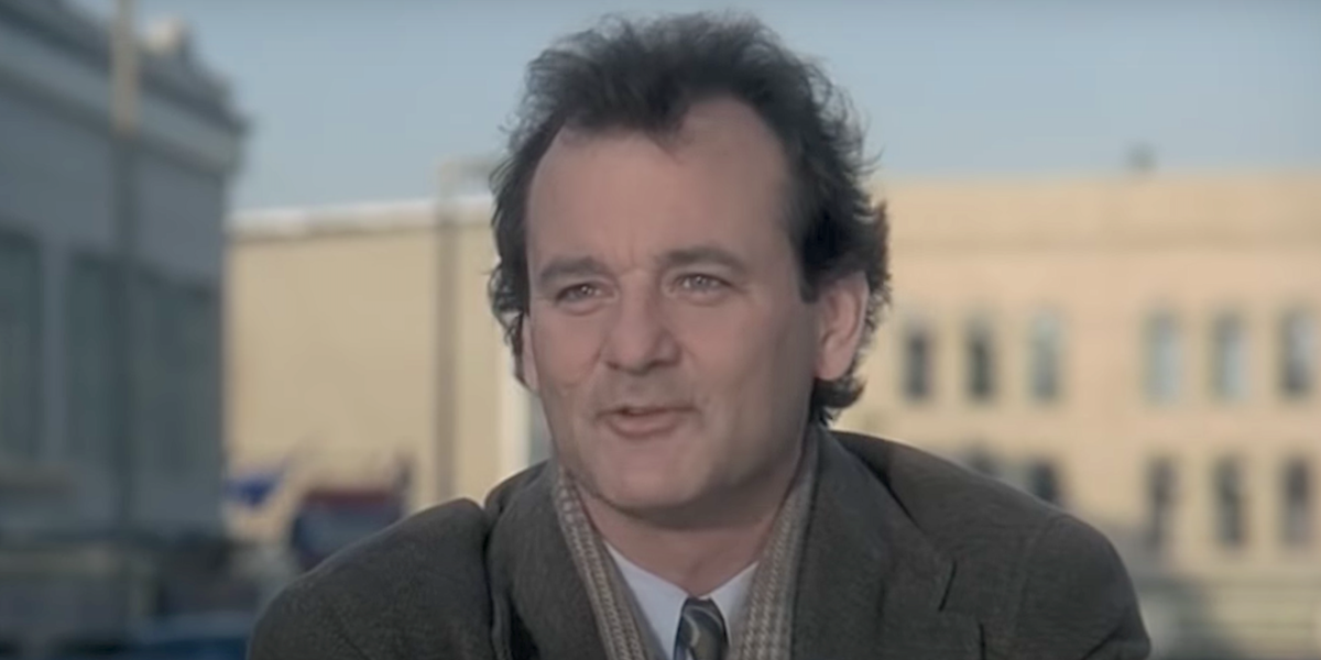 groundhog day bill murray helping people in car