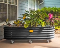 Raised garden bed on wheels