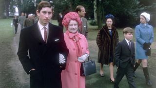 Prince Charles arm in arm with Queen Elizabeth the Queen Mother (1900 - 2002) at Sandringham. Prince Philip the Duke of Edinburgh, Princess Margaret, Princess Anne and Prince Andrew all walk behind them.