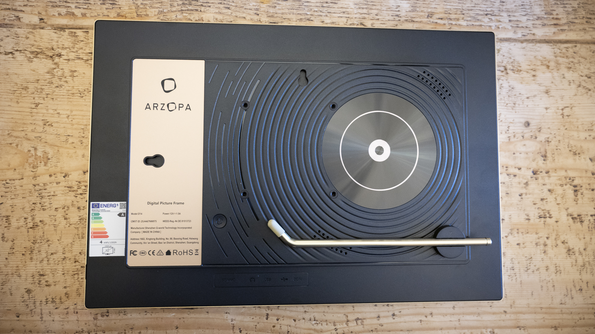 Rear of Arzopa D14 photo frame showing 'record player' design