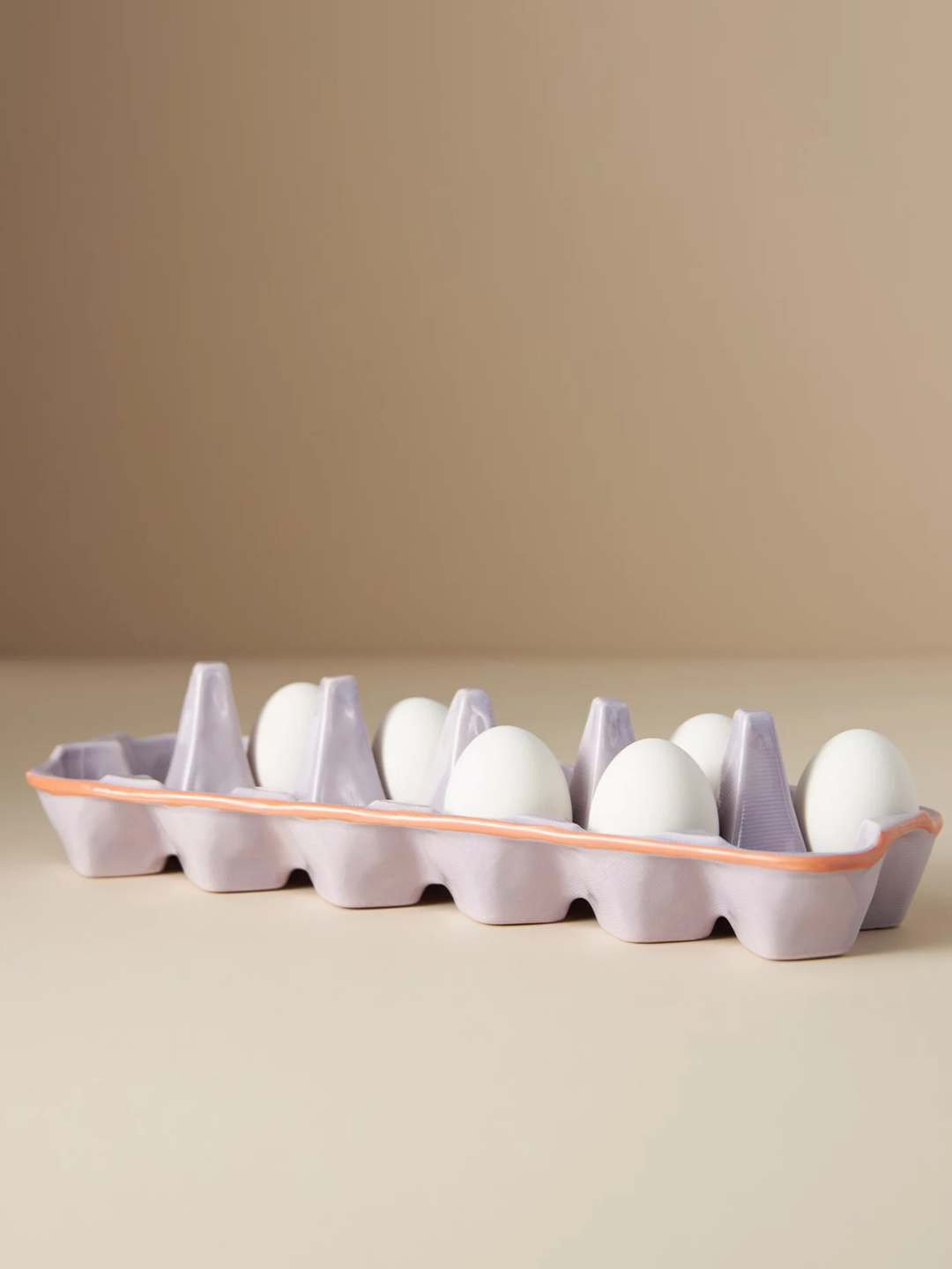 A lilac ceramic egg crate from Anthropologie