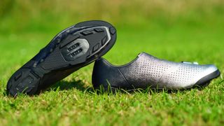 Shimano RX801 gravel shoe in silver showing the sole of the shoe