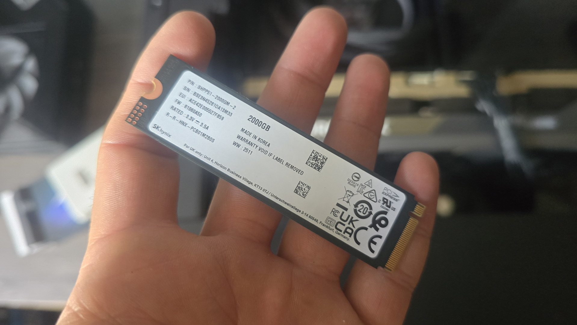 An SK Hynix Platinum P51 drive installed inside a gaming PC.