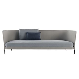 Long grey interior sofa with grey and blue cushions