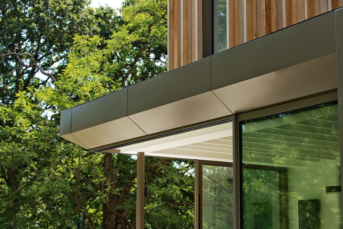 modern extension overhand with zinc cladding