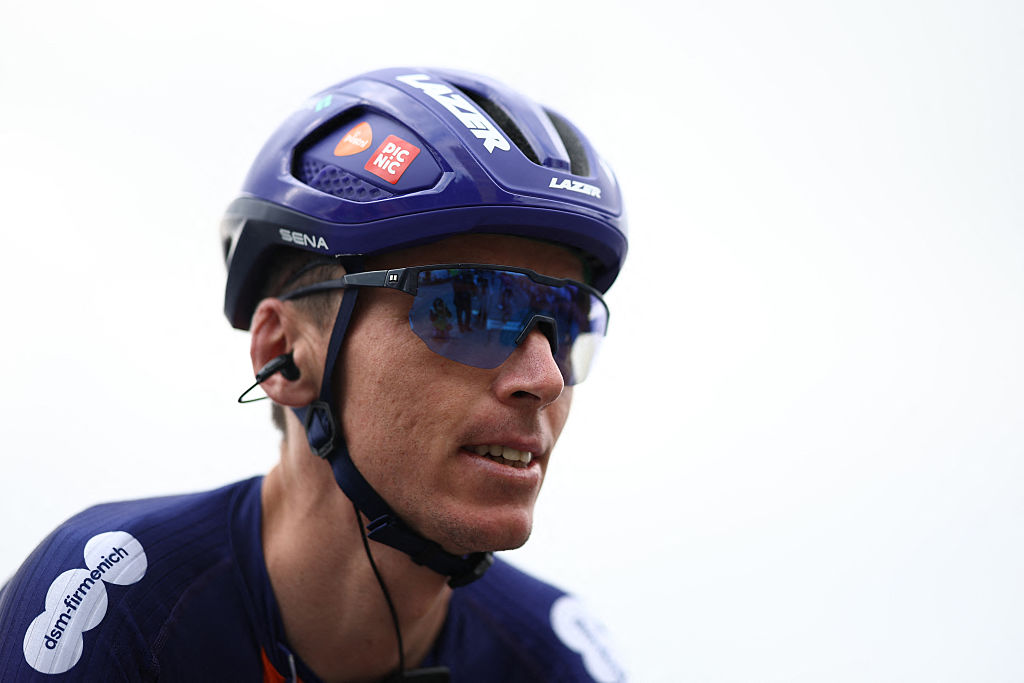 Team Picnic PostNL's French rider Romain Bardet reacts prior to the start of the 1st stage of the 77th edition of the Criterium du Dauphine cycling race, 195,8 km between DomÃ©rat and Montlucon, on June 8, 2025. (Photo by Anne-Christine POUJOULAT / AFP)
