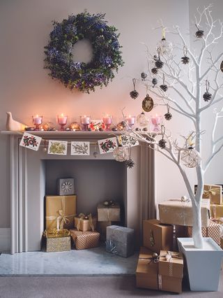 A plant painted white as a Christmas tree