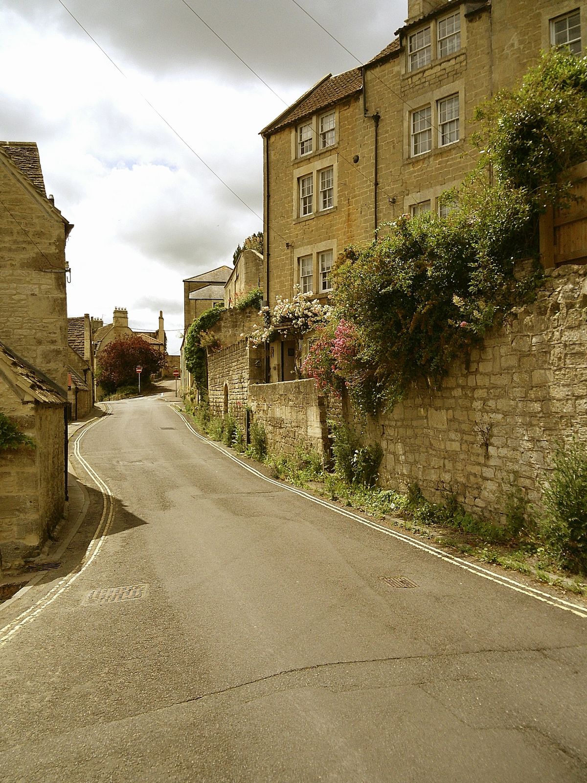 Sample image taken with Camp Snap 2 digital compact camera, showing road leading away with strong yellow color cast