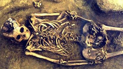 The 7,700-year-old remains of a mother and her twins.