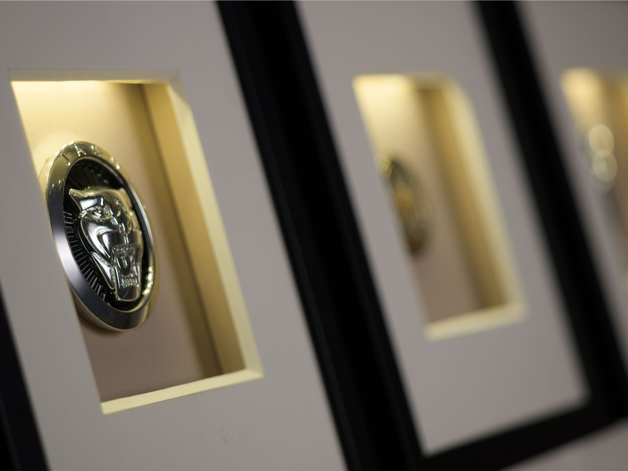 Framed Jaguar badges
