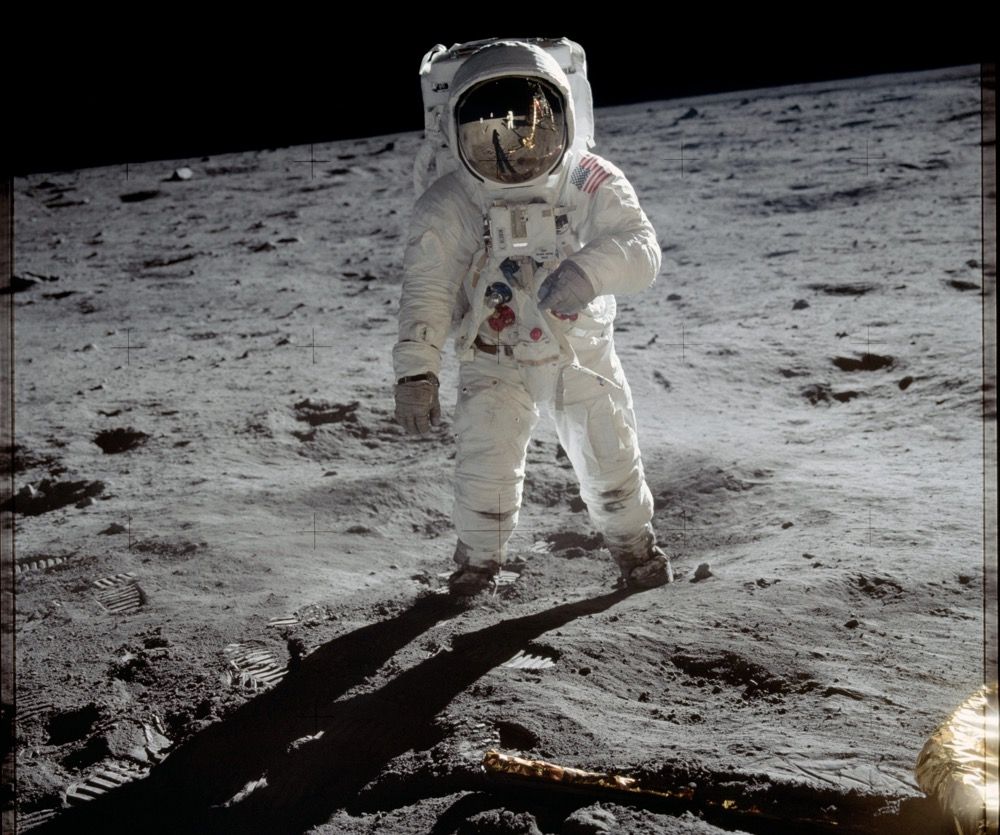 Astronaut Buzz Aldrin walks on the surface of the moon near the leg of the lunar module Eagle during the Apollo 11 mission on July 20, 1969. 